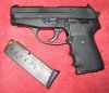 Sig Sauer P239 with spare mag.jpg