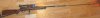 Squire Bingham Kmart rifle, 22 liner, a piece of Mosin Nagant barrel with a piece of surveyers t.jpg