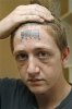 forehead-barcode-tattoo-2.jpg